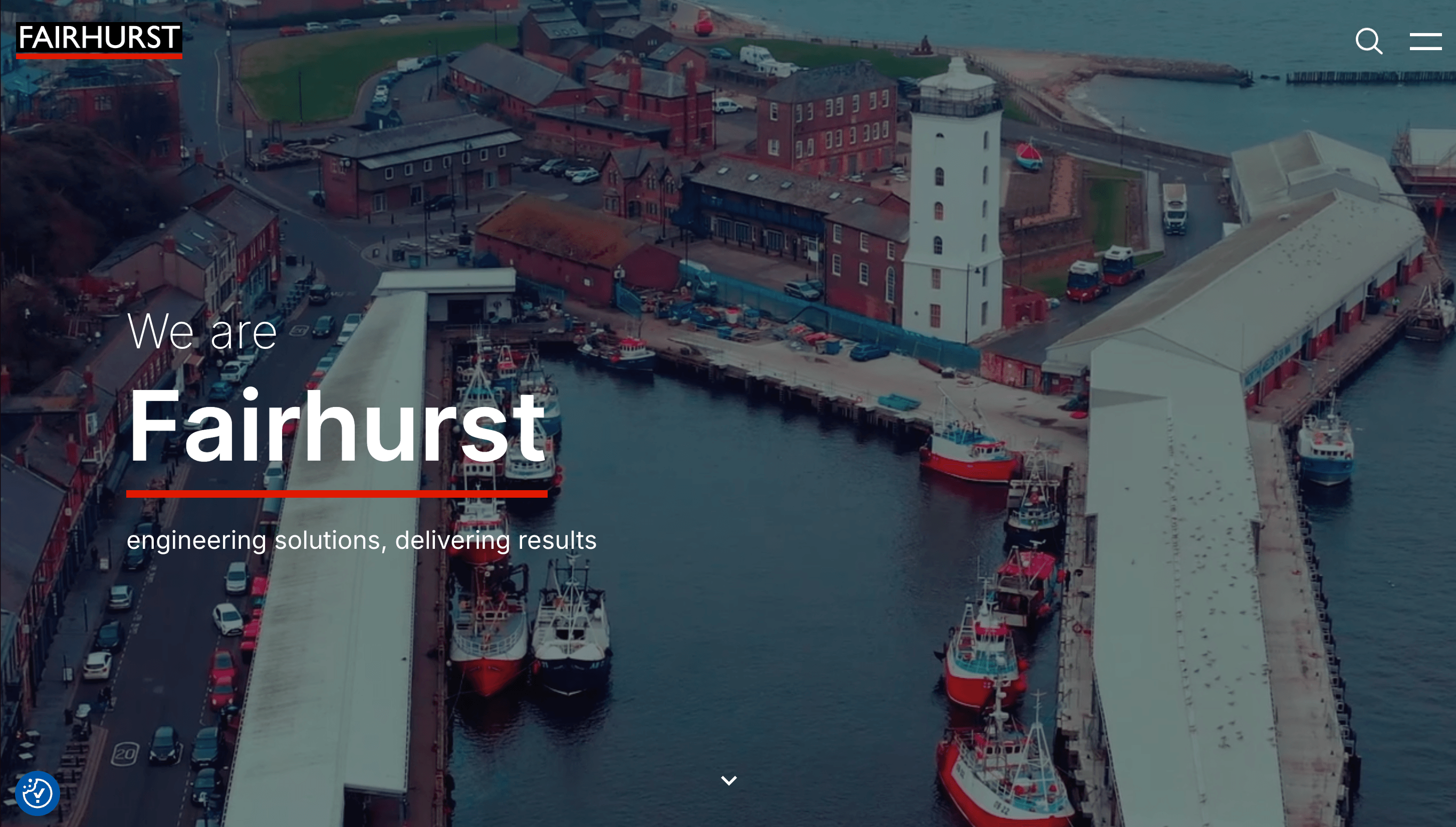 Fairhurst homepage hero image showing an aerial view of a harbour with boats, warehouses and a lighthouse.